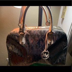 Michael Kors MK logo silver patent leather handbag
